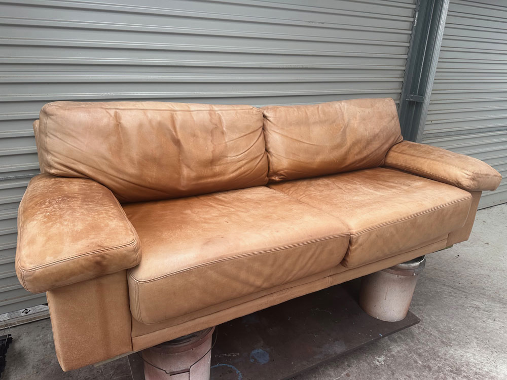 Faded leather couch