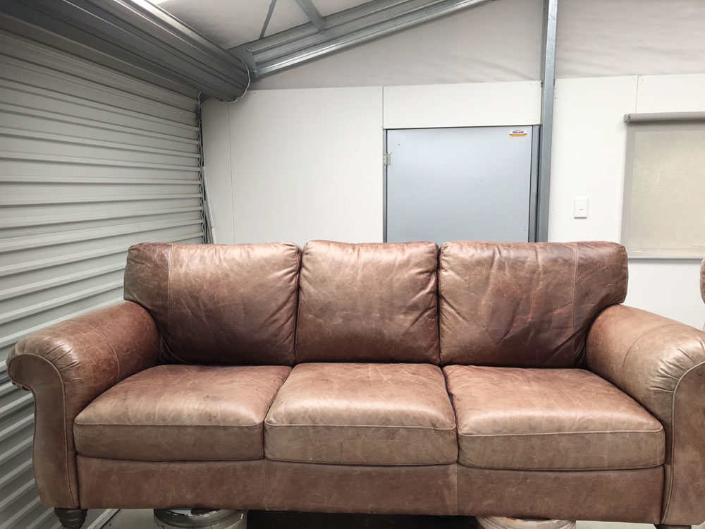 Faded Waxed Oiled leather couch